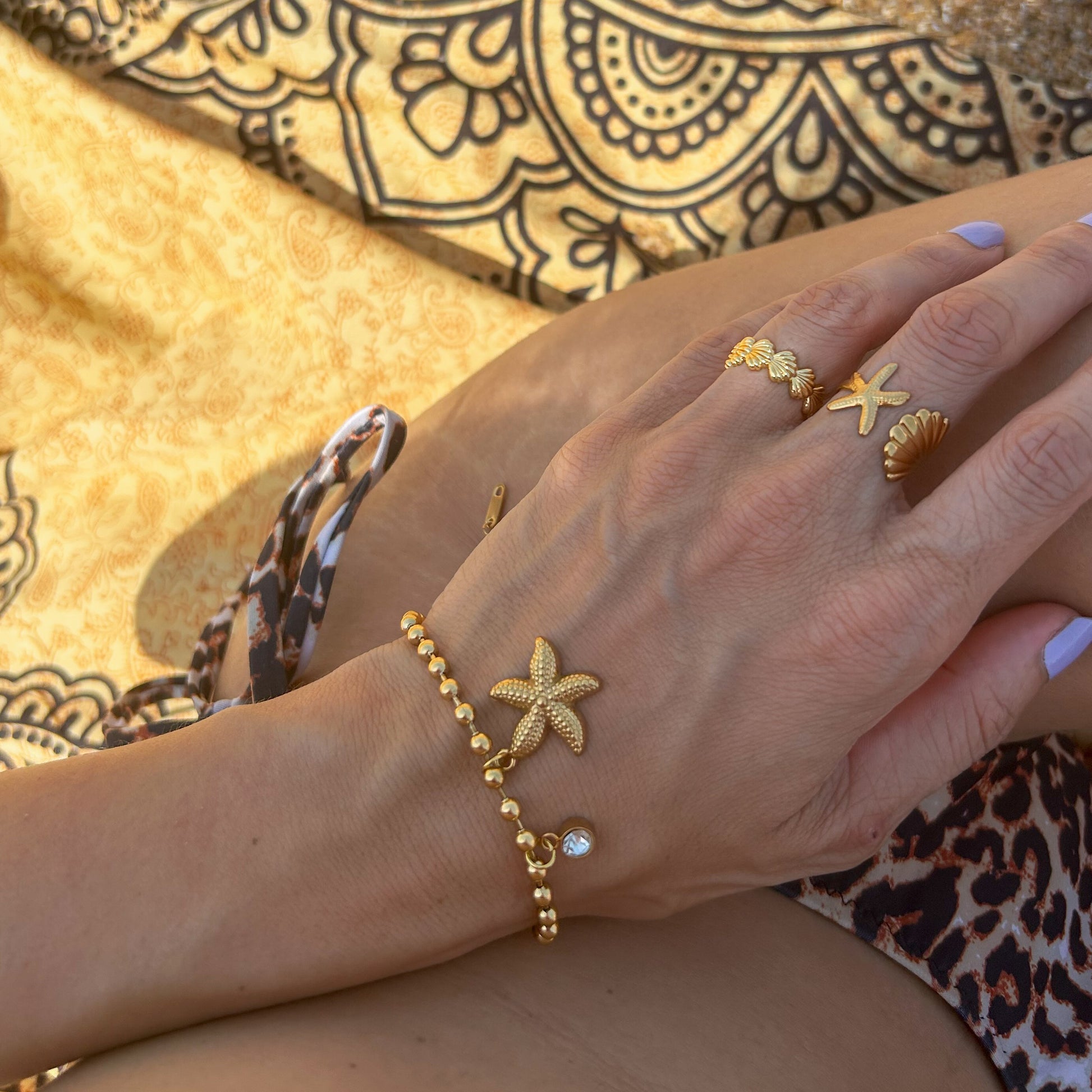 Gold Starfish and Diamond Charm Bracelet