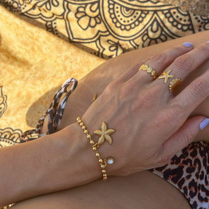 Gold Starfish and Diamond Charm Bracelet