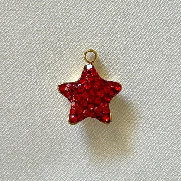 Gold and red gems star charm