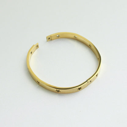 Gold bangle stars open