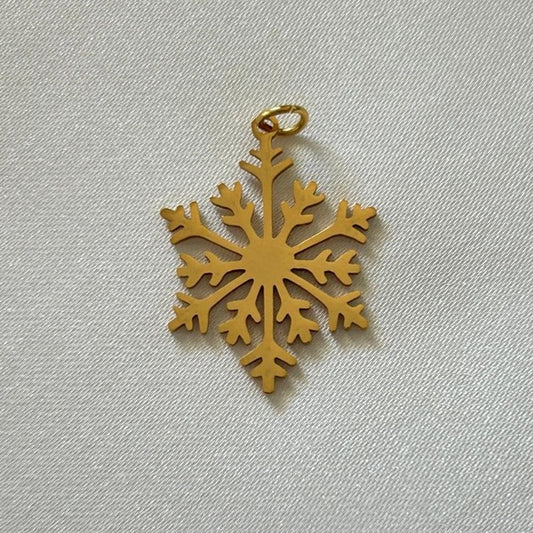 Gold snowflake charm